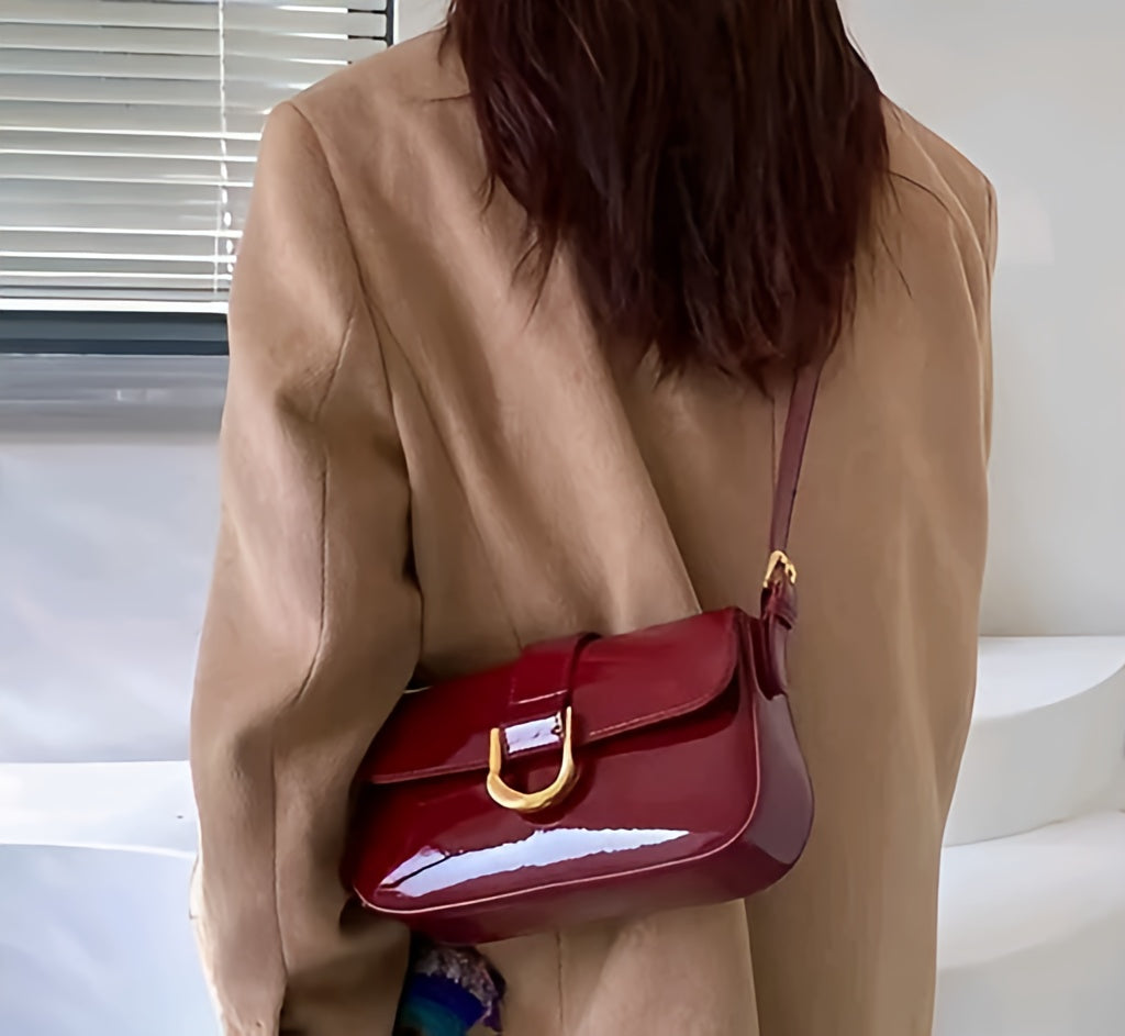 Vintage-Inspired Cherry Red Patent Leather Shoulder Bag with Gold Horseshoe Buckle