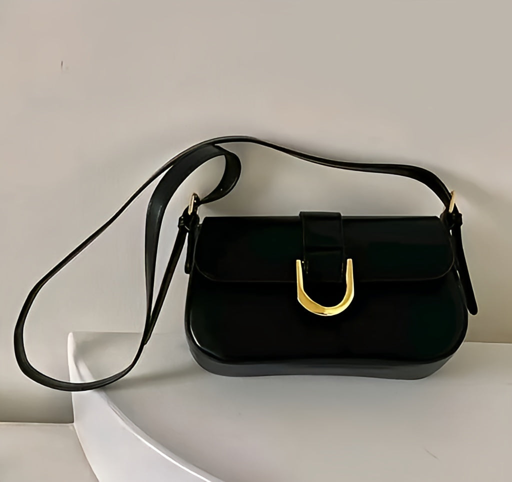 Vintage-Inspired Cherry Red Patent Leather Shoulder Bag with Gold Horseshoe Buckle