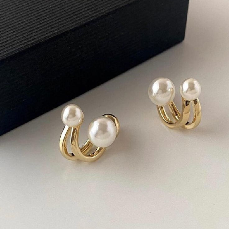 The Orbitale Bloom: Dual-Pearl Gilded Arc Studs