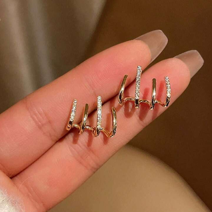 The Gilded Meridian: Quadruple-Arch Pavé Huggies