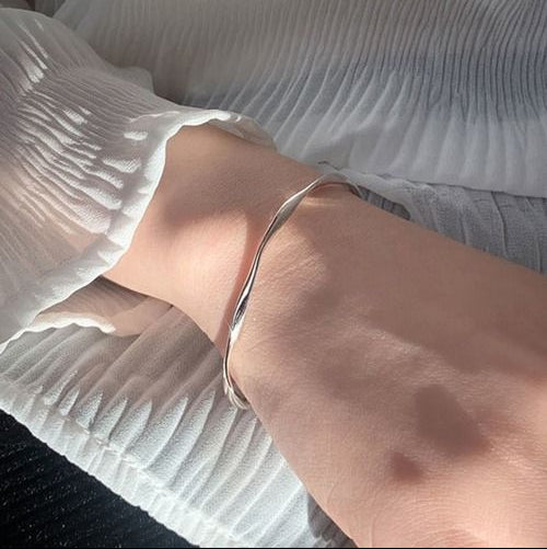 The Helix Horizon: Sculptural Twisted Bangle Duo