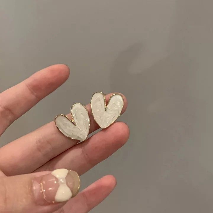 The Coeur de Perle: Gilded Marbled Enamel Heart Studs