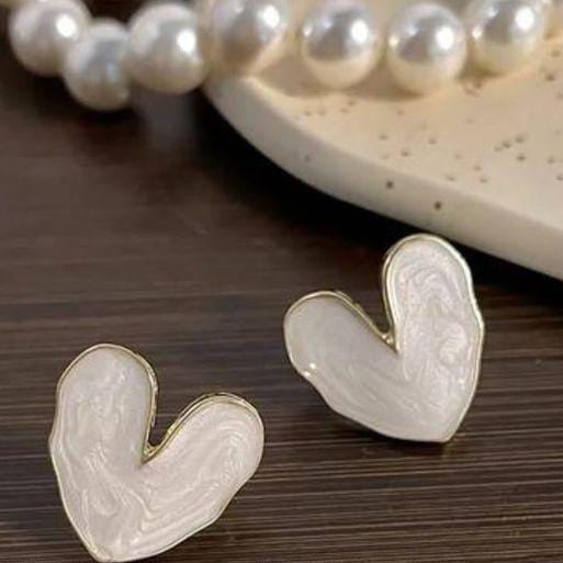 The Coeur de Perle: Gilded Marbled Enamel Heart Studs
