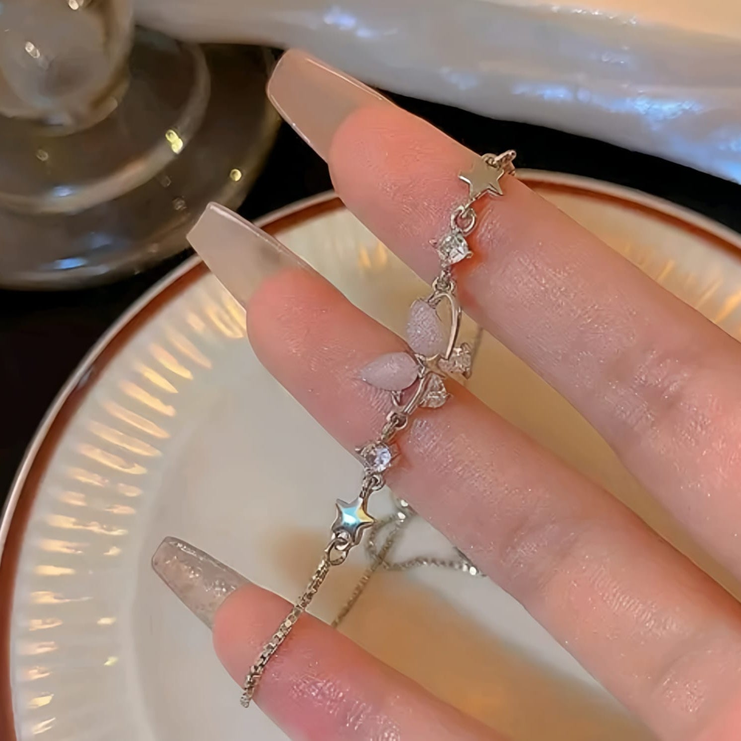 The Celestial Papillon: Gilded Butterfly & Starry Orbit Bracelet