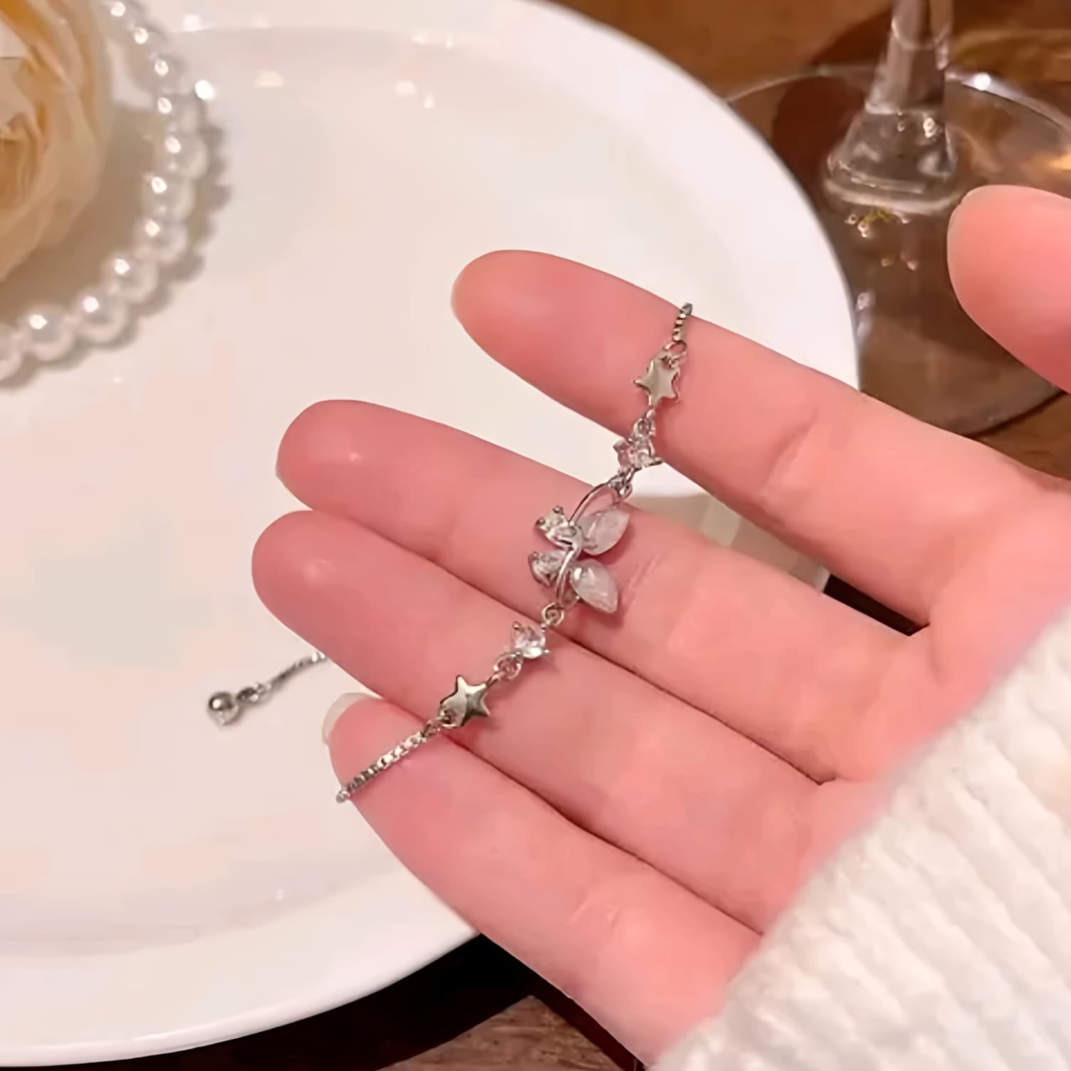 The Celestial Papillon: Gilded Butterfly & Starry Orbit Bracelet